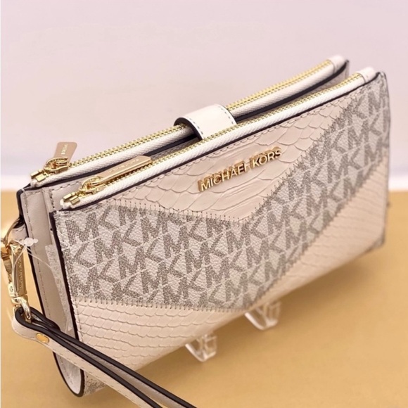 MICHAEL KORS LG
DOUBLE ZIP
WRISTLET
WALLET PHONE
HOLDER LIGHT
CREAM MULTI - Picture 1 of 12